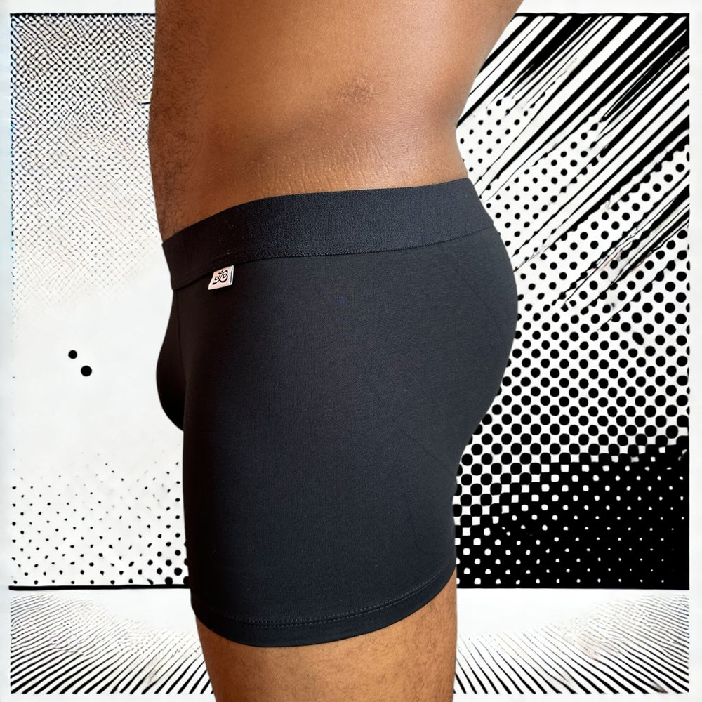 
                  
                    Boxer homme Le Beau Tom - noir, confort, marque française, design lyonnais, fabrication Portugal, vue de profil gauche
                  
                